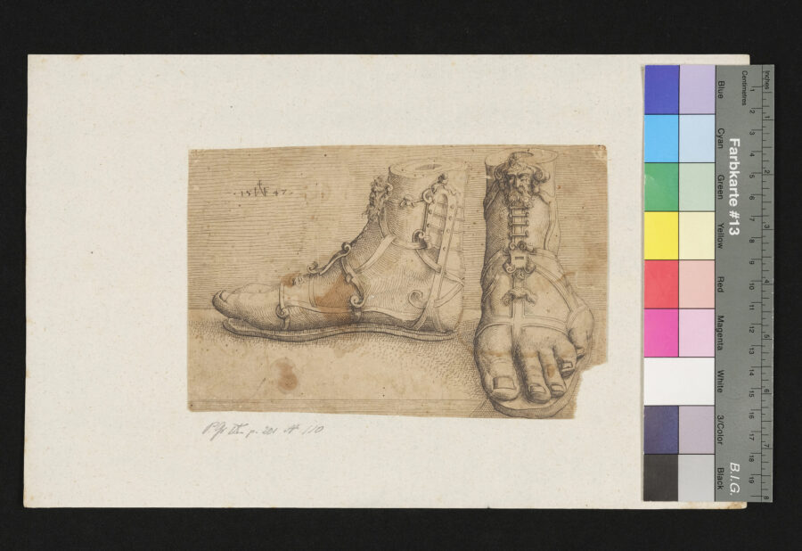 Zwei Füße, mit Sandalen bekleidet
